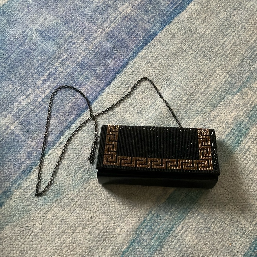 Elegant Black and Gold Clutch